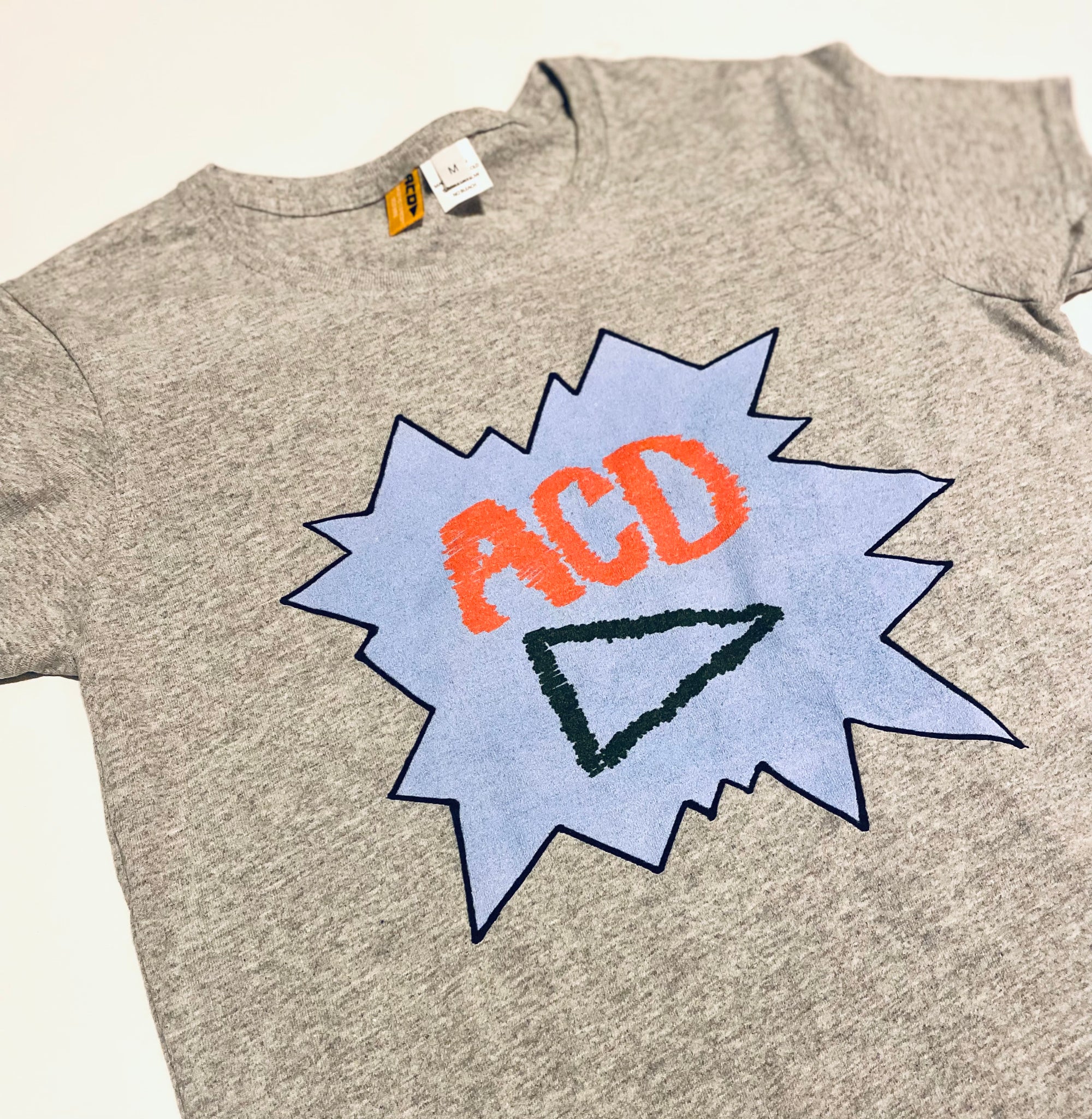 ACTION PRINT GRAPHIC TEE
